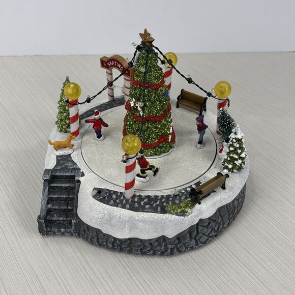 Kurt S. Adler 7-Inch Battery-Operated Musical LED Ice Rink with Tree Table Piece - Picture 1 of 7